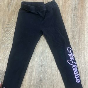 Jordan leggings with purple Air Jordan on the leg 4t